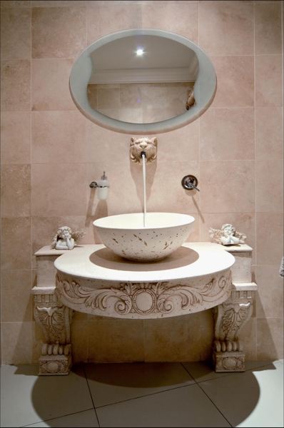 Eurotrend Fourways furnished the bathrooms throughout this remarkable home. In accordance with the theme of the home, the company supplied specific products that complement its style. This splendid stone basin is mounted meticulously on an intricate and detailed structure, and together with a uniquely designed faucet, this impressive feature is reminiscent of true Tuscan charm. Eurotrend’s main goal is to facilitate the creation of bathrooms for people with high demands in terms of bathroom architecture, product design and authenticity of materials.