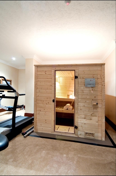 Wellness Fitness Africa (011 463 3398). Wellness Fitness Africa, renowned for its professionalism and high quality products, installed in this home a solid wood WFA Sundsvall sauna. The sauna is constructed of 45mm thick natural Nordic spruce walls which ensure a high degree of stability and a long lifetime as well as providing an optimal sauna environment.The sauna has a high powered heater with volcanic sauna stones and is furnished with all sauna accessories: bucket and ladle, sandtimer and thermometer/hygrometer.