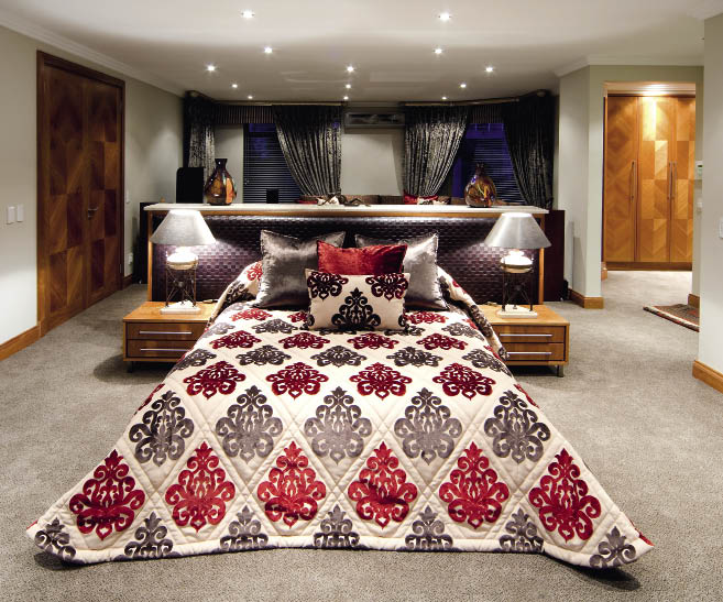 The master suite has been decorated in a Moroccan style. Home Flair used a colour palette that comprises rich reds and burgundies, as well as luxurious fabrics that are soft to the touch. Downlights as well as fashionable lamp shades were also added as final touches to create an elegant ambience.(HOME FLAIR 011 432 6603)