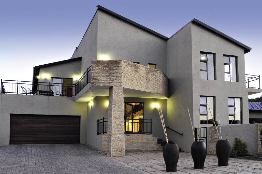  Kabu Design Architects designed (www.kabuarch.co.za) this contemporary masterpiece while following African space making design principles throughout the entire process. The design is stylised and simple, while simultaneously being comfortable and cost effective, and boasts every requirement for the perfect modern lifestyle. The concentric and linear shapes of the home were inspired by the Zulu huts eziko living concept articulated into modern finishes. This architectural practice prides itself on maintaining a high level of architectural quality and practicality without changing the old cultural practices of clients.