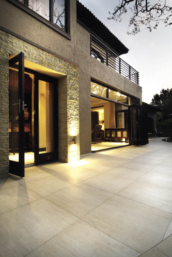 ON THE TILES (0861 688 688)Liane Kruger from the Pretoria showroom of tile trendsetter, On The Tiles, assisted with the selection of the tiles for this home. The tiles that were installed inside were used on the patio as well. Instead of cutting the patio tiles, On The Tiles used them in their full form, producing significant, flowing spaces that are visually striking.