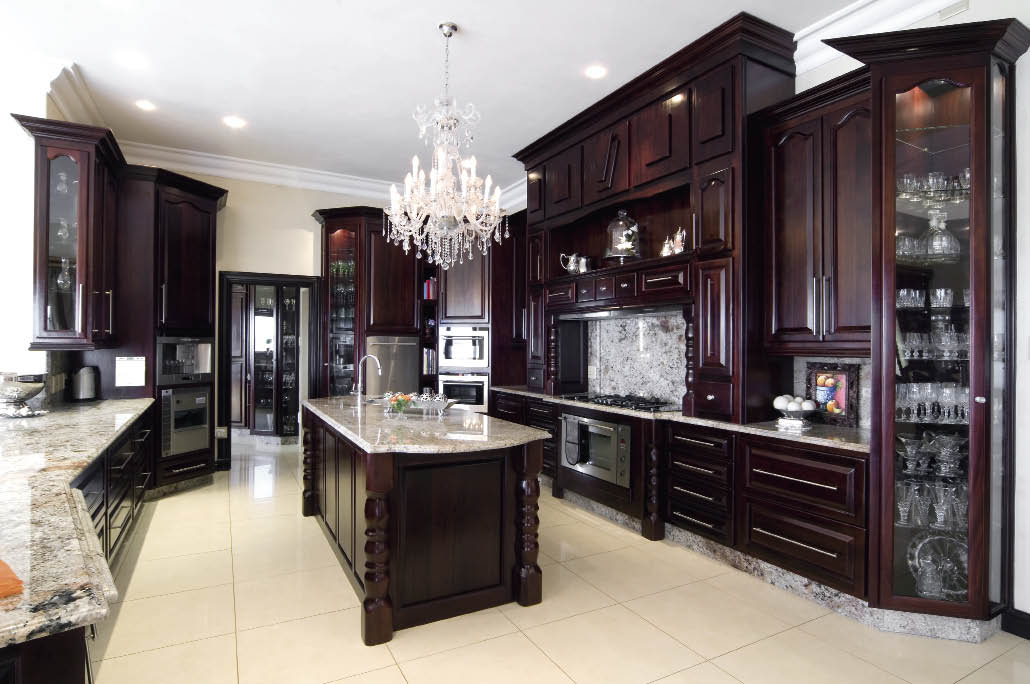 Using custom designs, EC Woodworth ( 012 811 0087)manufactured these kitchen units in American mahogany solid wood. The company installed the units with the utmost precision and also supplied and fitted the supawood skirtings, architraves and rose buds. The cabinetry was further sealed using satin varnish, thereby ensuring its longevity and beauty.